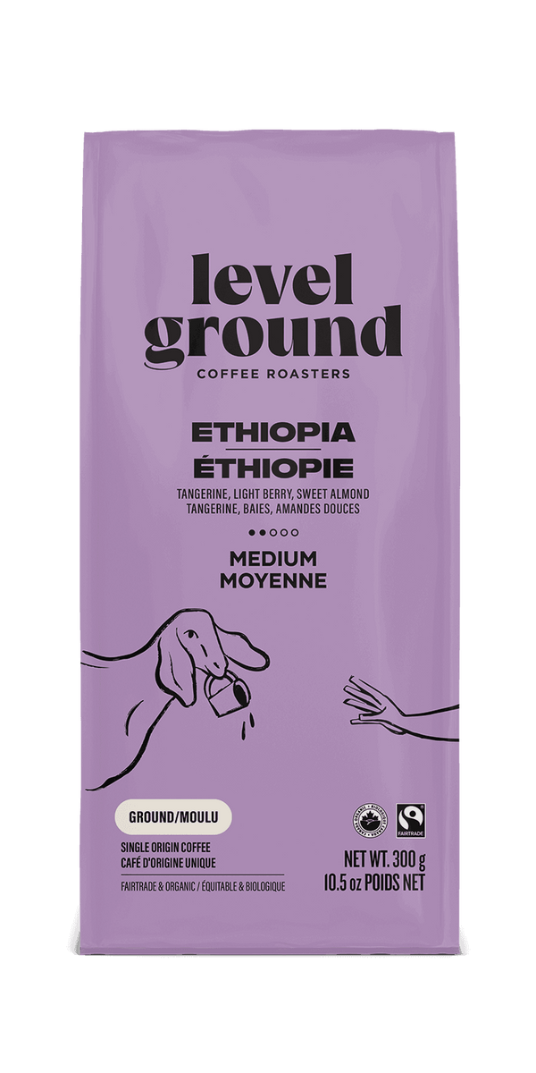 Close-up of Level Ground Ethiopian Medium Roast Coffee packaging showing tasting notes of tangerine, berry, and sweet almond