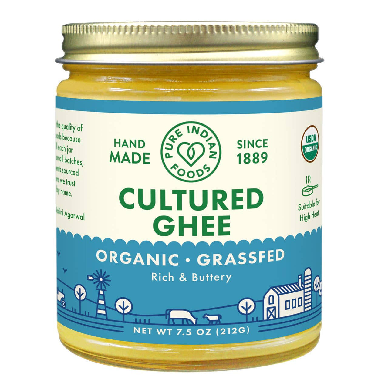 Close-up of organic cultured ghee texture showing rich golden colour inside the jar