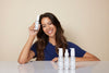 Woman using Plaine Products Vitamin C Face Wash as part of daily skincare routine