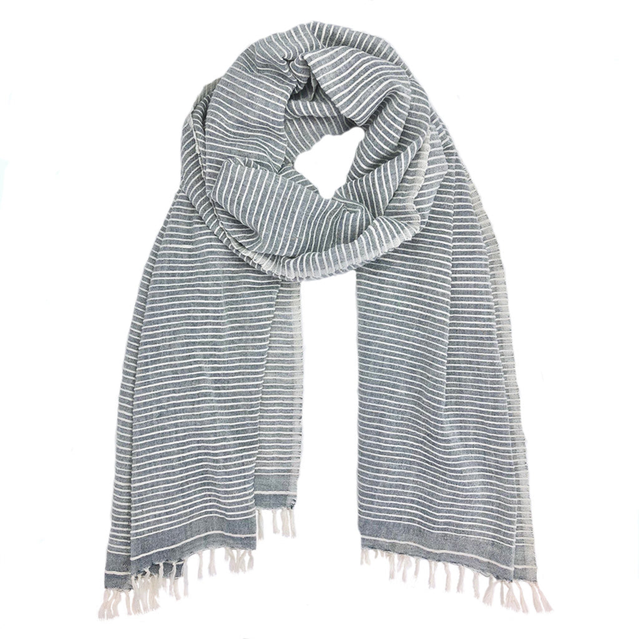 Striped scarf with fringes on a white background