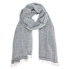 Striped scarf with fringes on a white background