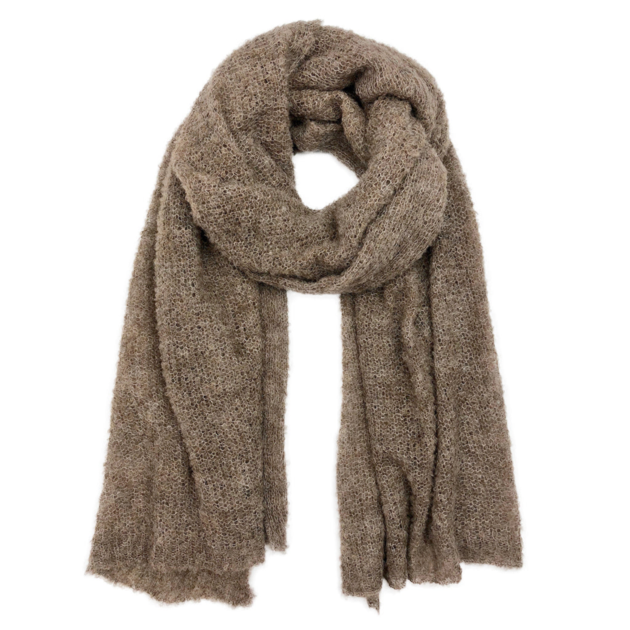 Brown knitted scarf on a white background