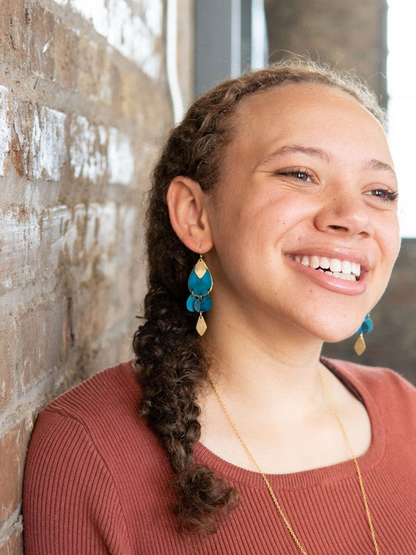 Fair trade blue and gold drop earrings made from recycled brass-plated metal