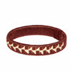 Brown bracelet with geometric pattern on a white background