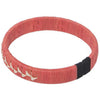 Coral woven palm flower bracelet handcrafted by indigenous Wounaan weavers with sterling silver detail