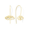 Gold floral earrings on thin hooks against a white background