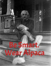 Person sitting on steps with text 'Be Smart. Wear Alpaca' in a humorous style.