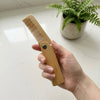 Foldable Bamboo Hair Comb close-up showing smooth comb teeth