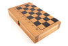 Wooden chessboard with checkered pattern on a white background