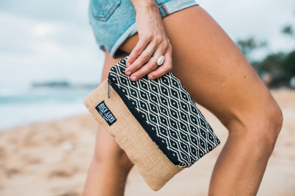 Close-up of the Foldover Clutch - Sara showing handwoven fabric and jute texture