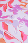 Colorful floral and bird pattern on a light purple background