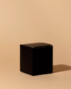 Animated gif of makesy® black soft touch candle box showing velvety matte texture and packaging detail