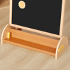 Animated view of the Tiny Land double-sided magnetic easel detaching from its triangular base for tabletop play