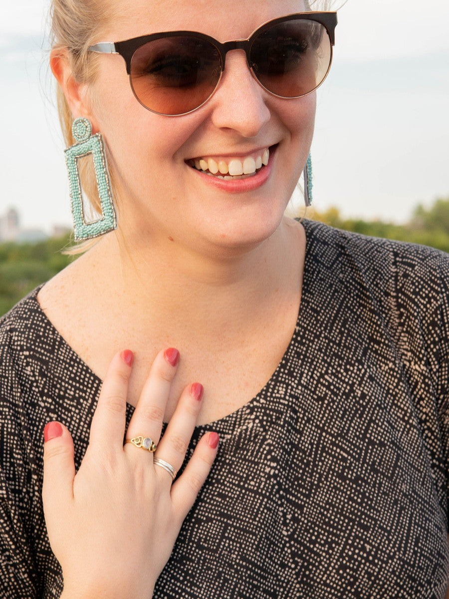 Adjustable antiqued brass moonstone and peridot stone ring worn on hand — Fair Anita