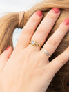 Gold adjustable moonstone ring with peridot stones, close-up view — Fair Anita India Collection