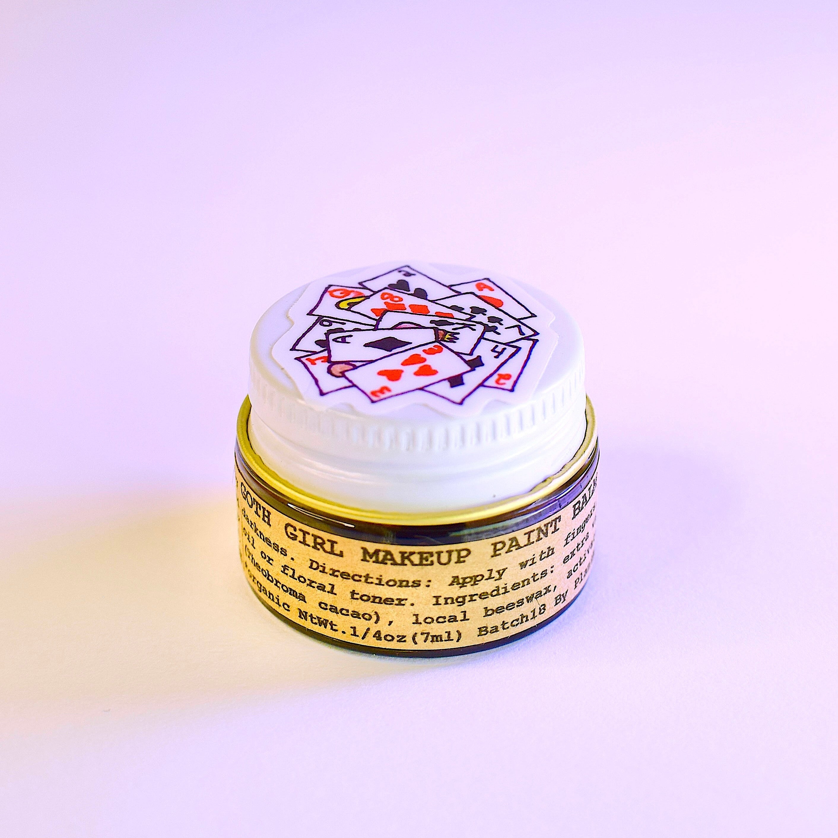 Makeup eraser with a colorful label on a white background