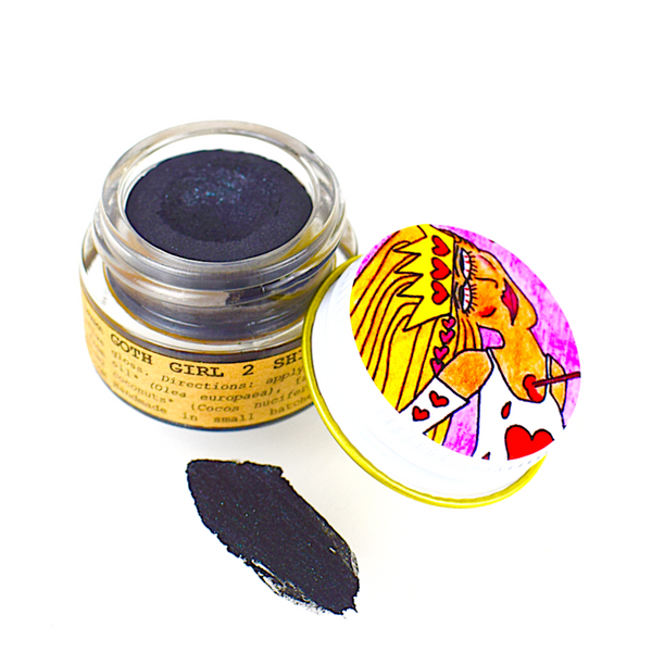 Goth Girl 2 Shimmer Balm in a small glass jar with a metal lid, showing dark sparkly natural makeup on a white background