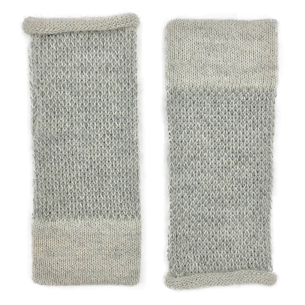 Pair of gray knit arm warmers on a white background
