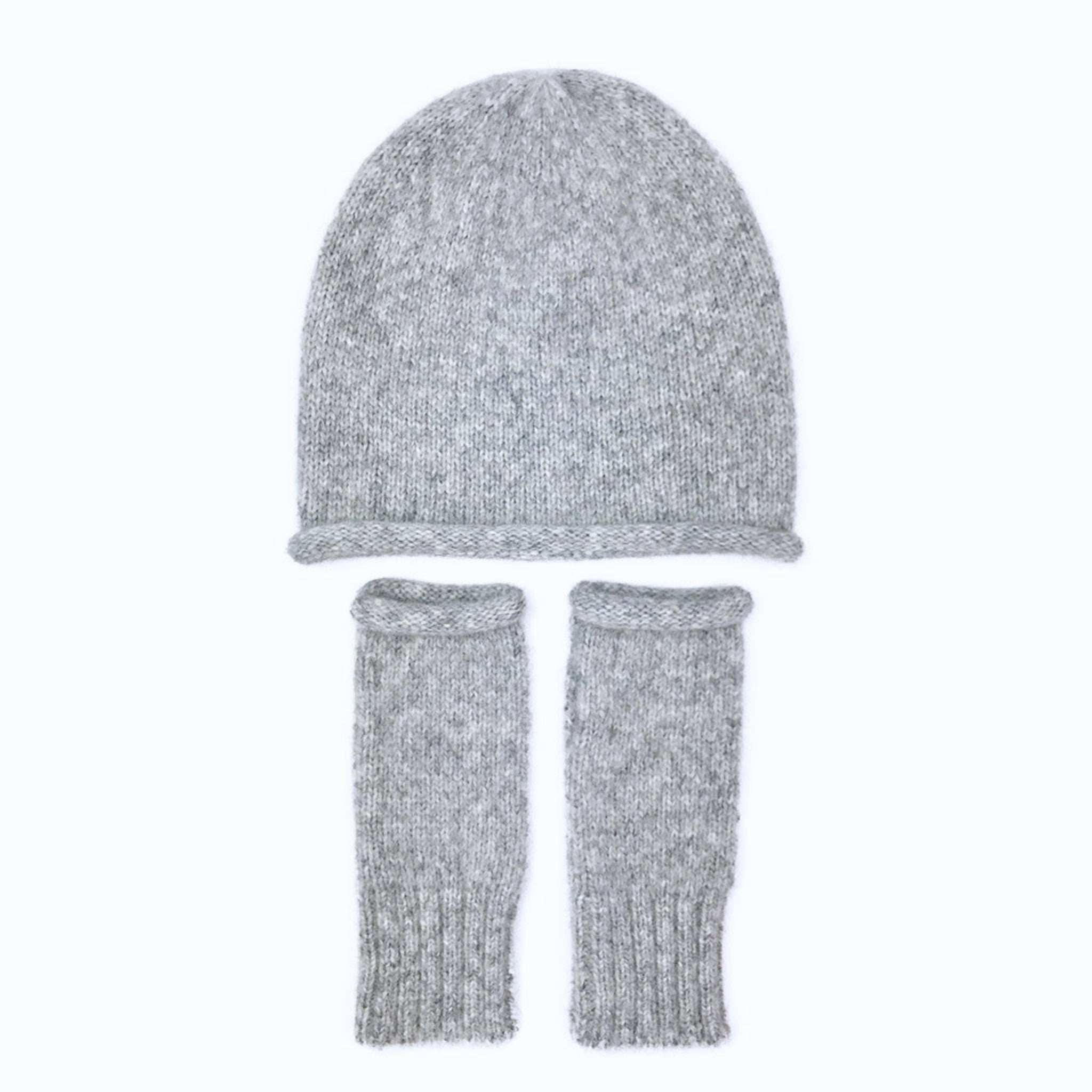 Gray knit hat and scarf set on a white background
