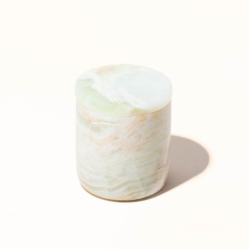 Styled view of makesy® 10oz Onyx candle vessel as a finished candle product