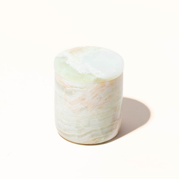 Styled view of makesy® 10oz Onyx candle vessel as a finished candle product