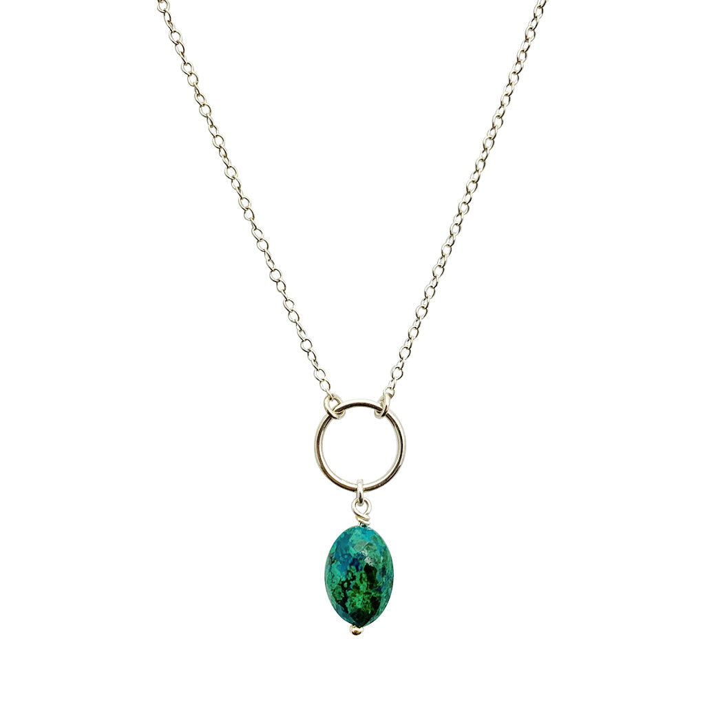 Necklace with a green teardrop pendant on a white background