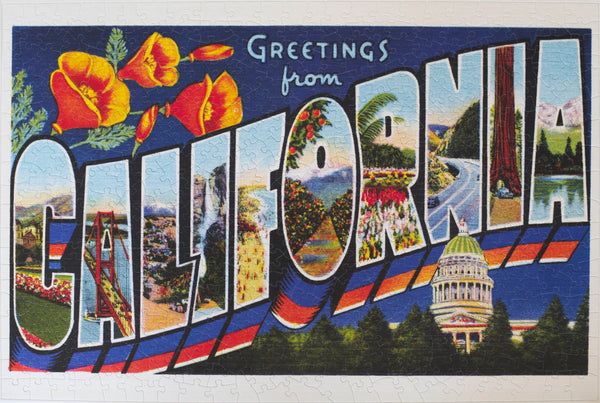 Completed Greetings from California 500-piece jigsaw puzzle showing vintage postcard art