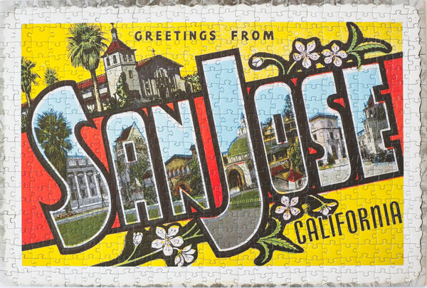 Completed Greetings from San Jose 500-piece jigsaw puzzle showing the vintage postcard artwork