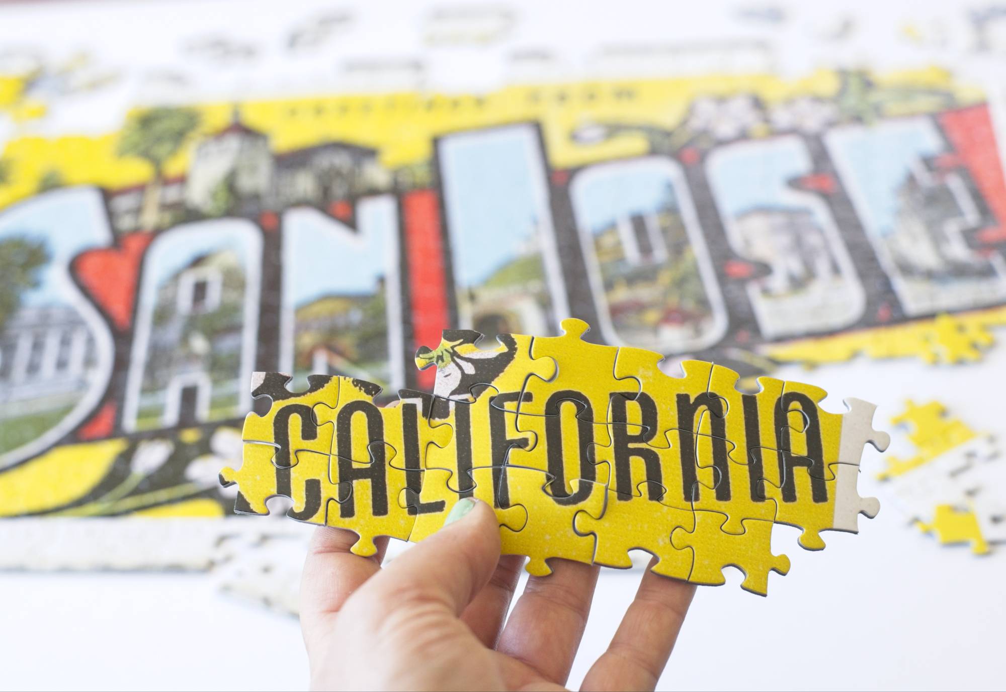 Close-up of Greetings from San Jose jigsaw puzzle pieces