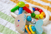 HABA Rattlefish Wooden Baby Rattle displayed as a sustainable baby shower gift option