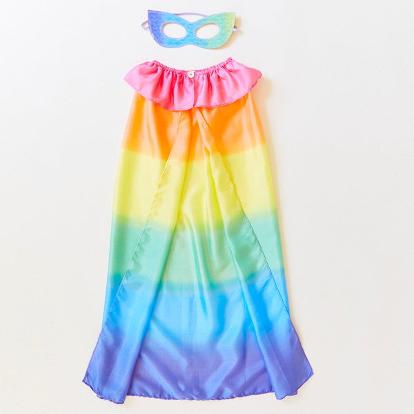 Transform your child into a fearless superhero with our Rainbow Superhero Cape and Mask Set. This vibrant costume set is perfect for dress-up adventures, Halloween, and everyday fun.