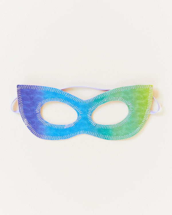 Transform your child into a fearless superhero with our Rainbow Superhero Cape and Mask Set. This vibrant costume set is perfect for dress-up adventures, Halloween, and everyday fun.