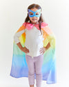 Transform your child into a fearless superhero with our Rainbow Superhero Cape and Mask Set. This vibrant costume set is perfect for dress-up adventures, Halloween, and everyday fun.