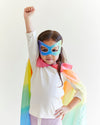 Transform your child into a fearless superhero with our Rainbow Superhero Cape and Mask Set. This vibrant costume set is perfect for dress-up adventures, Halloween, and everyday fun.