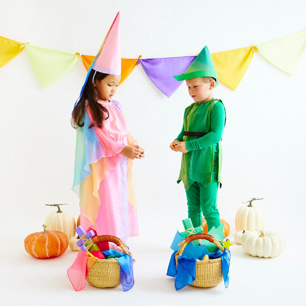 Unleash your child's imagination with our Peter Pan Silk Tunic and Hat Set. Crafted from pure mulberry silk, this versatile costume encourages open-ended play, perfect for dress-up, storytelling, and Halloween.