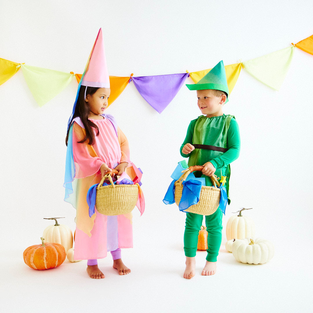 Unleash your child's imagination with our Peter Pan Silk Tunic and Hat Set. Crafted from pure mulberry silk, this versatile costume encourages open-ended play, perfect for dress-up, storytelling, and Halloween.