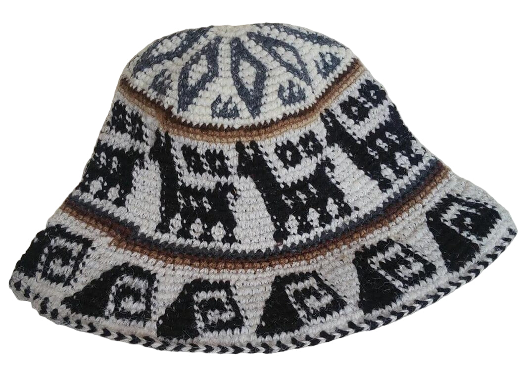 Handcrafted hat with geometric pattern on a white background