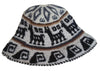 Handcrafted hat with geometric pattern on a white background