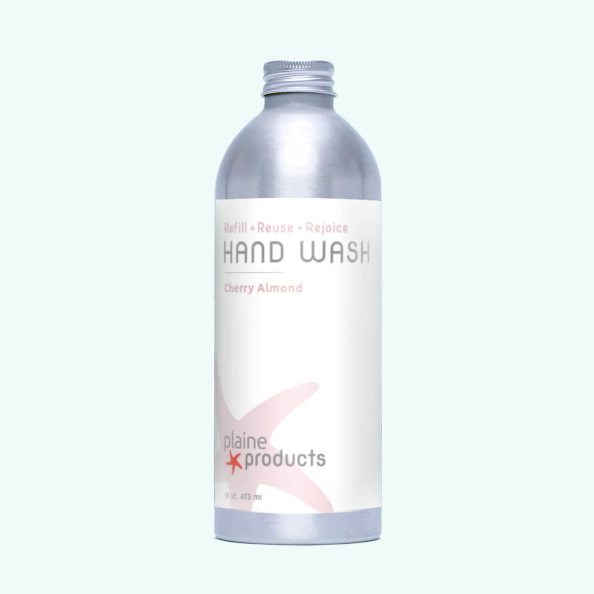 Hand wash bottle with silver cap and white label on a light gray background