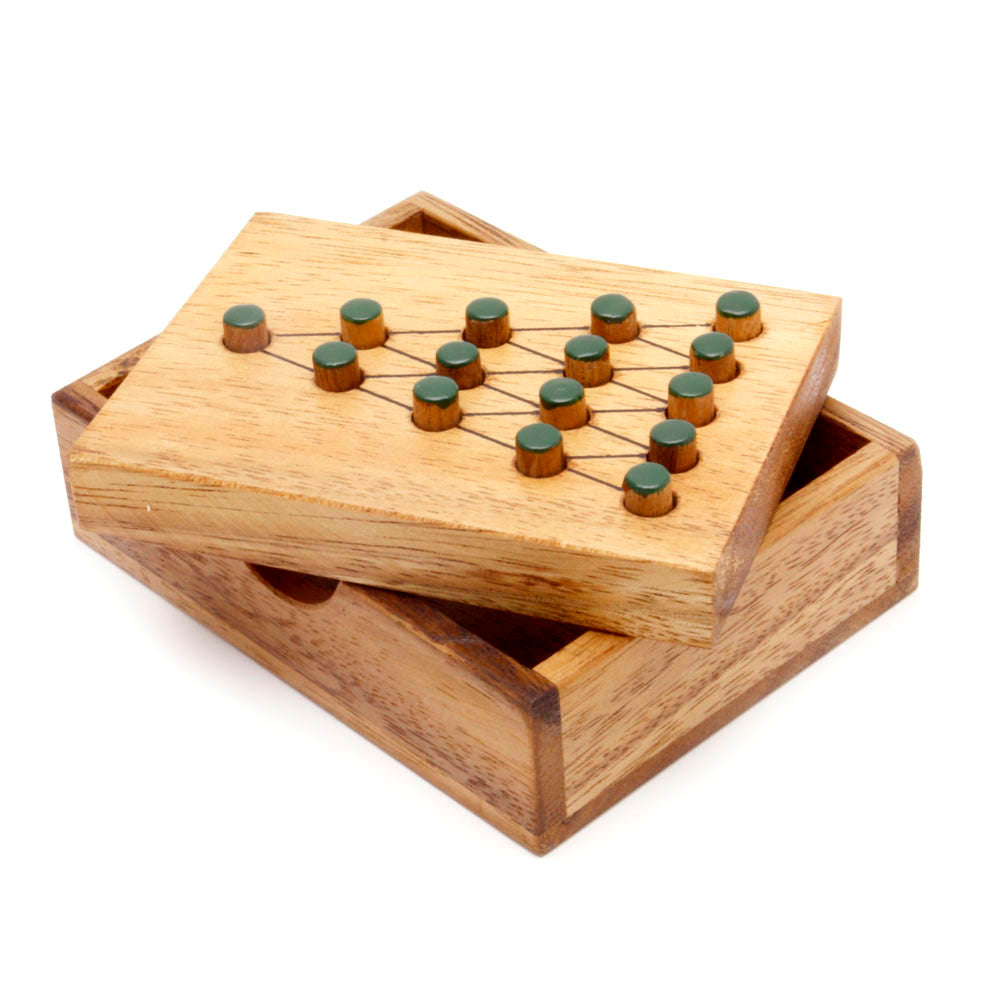 Wooden puzzle with green pieces on a white background