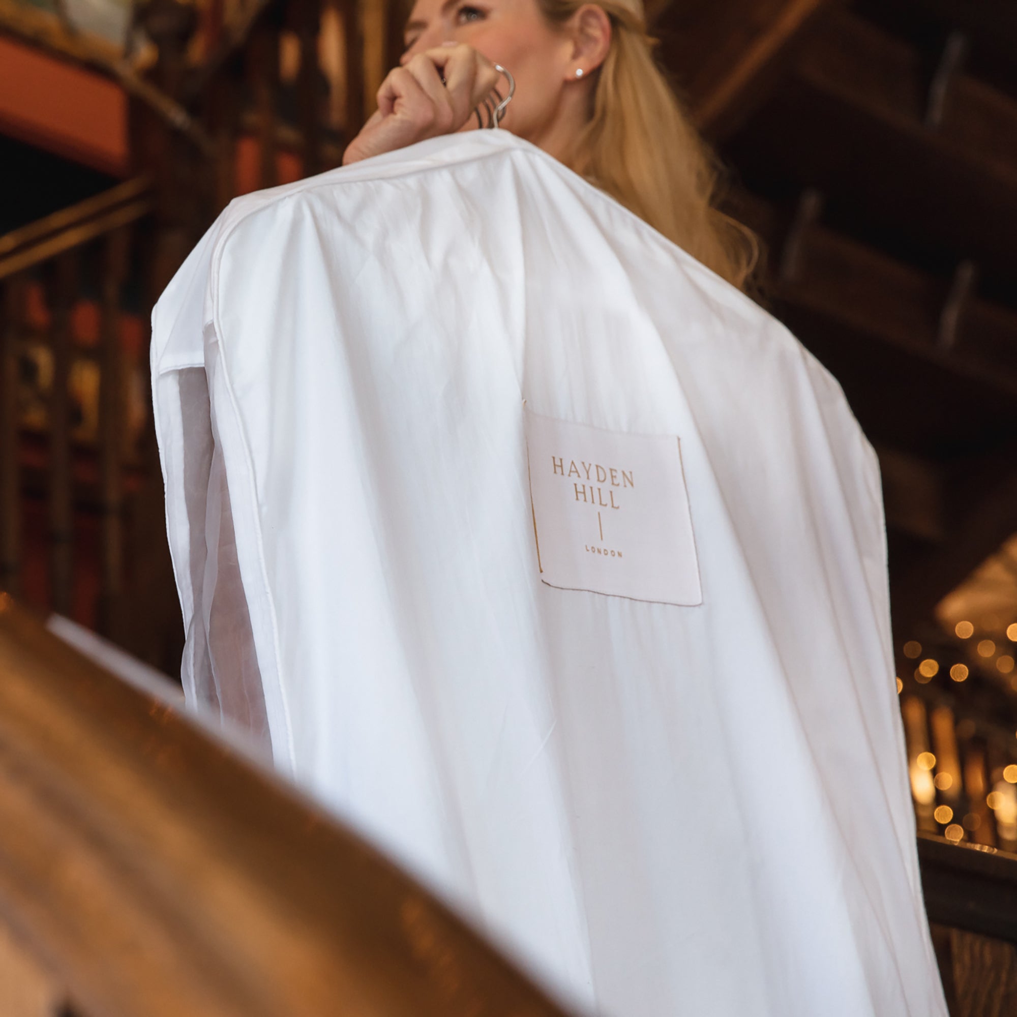Long organic cotton hanging garment bag in soft natural fabric for dress and coat storage