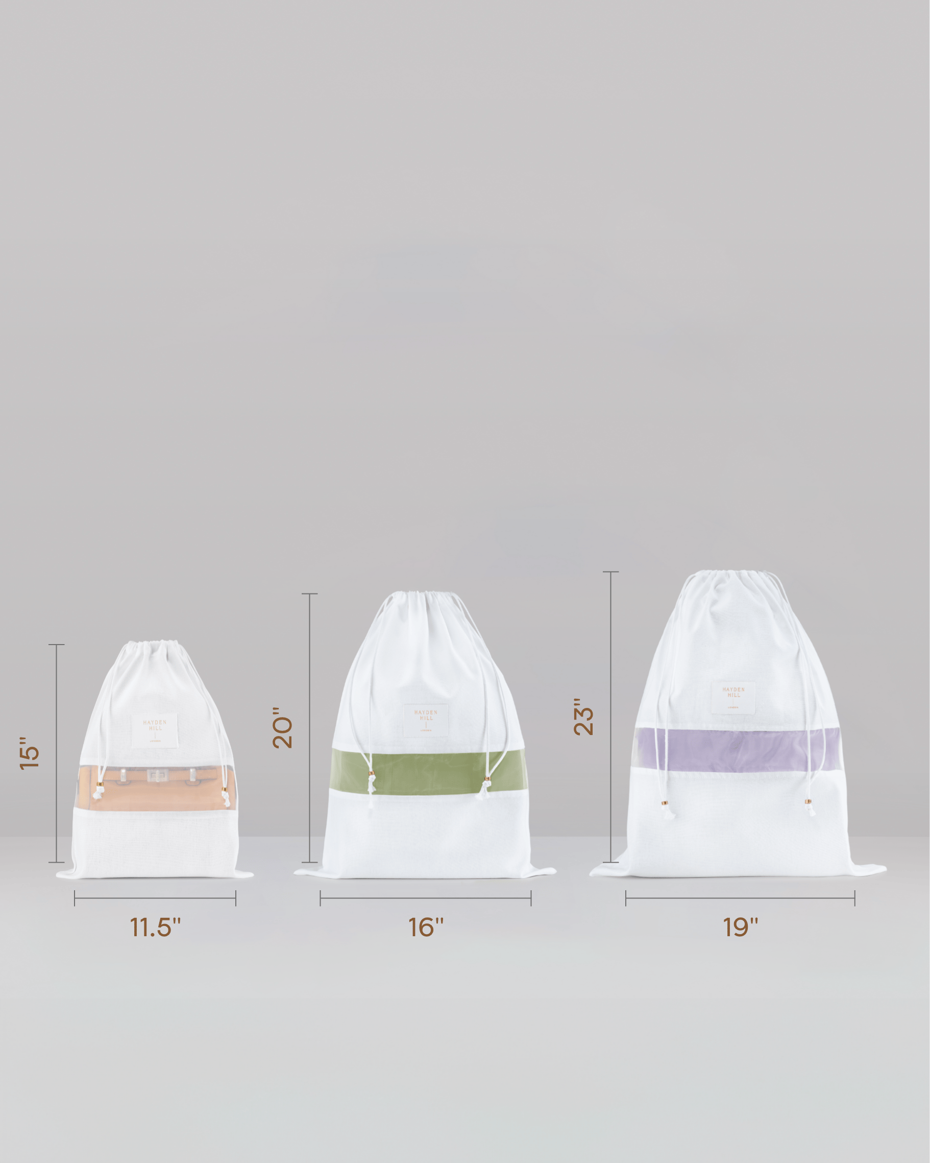 Hayden Hill organic cotton dust bags set of three with dimensions shown in inches — front view with garments inside