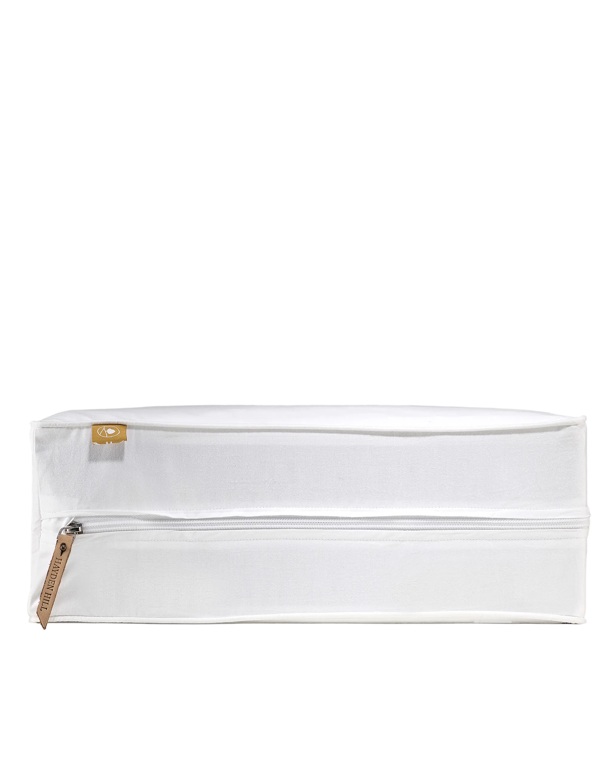 White pouch with a gold zipper on a gray background