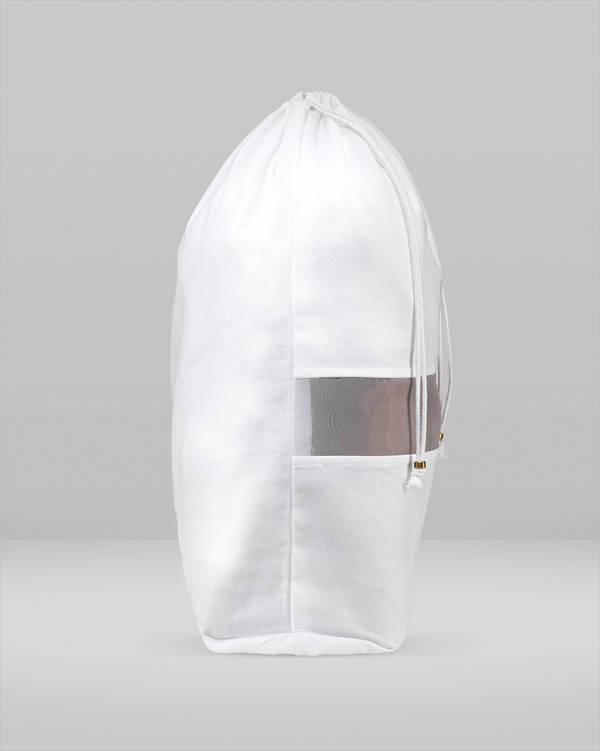 White hooded garment with mesh panel on a gray background