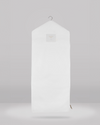 White hanging garment bag on a gray background