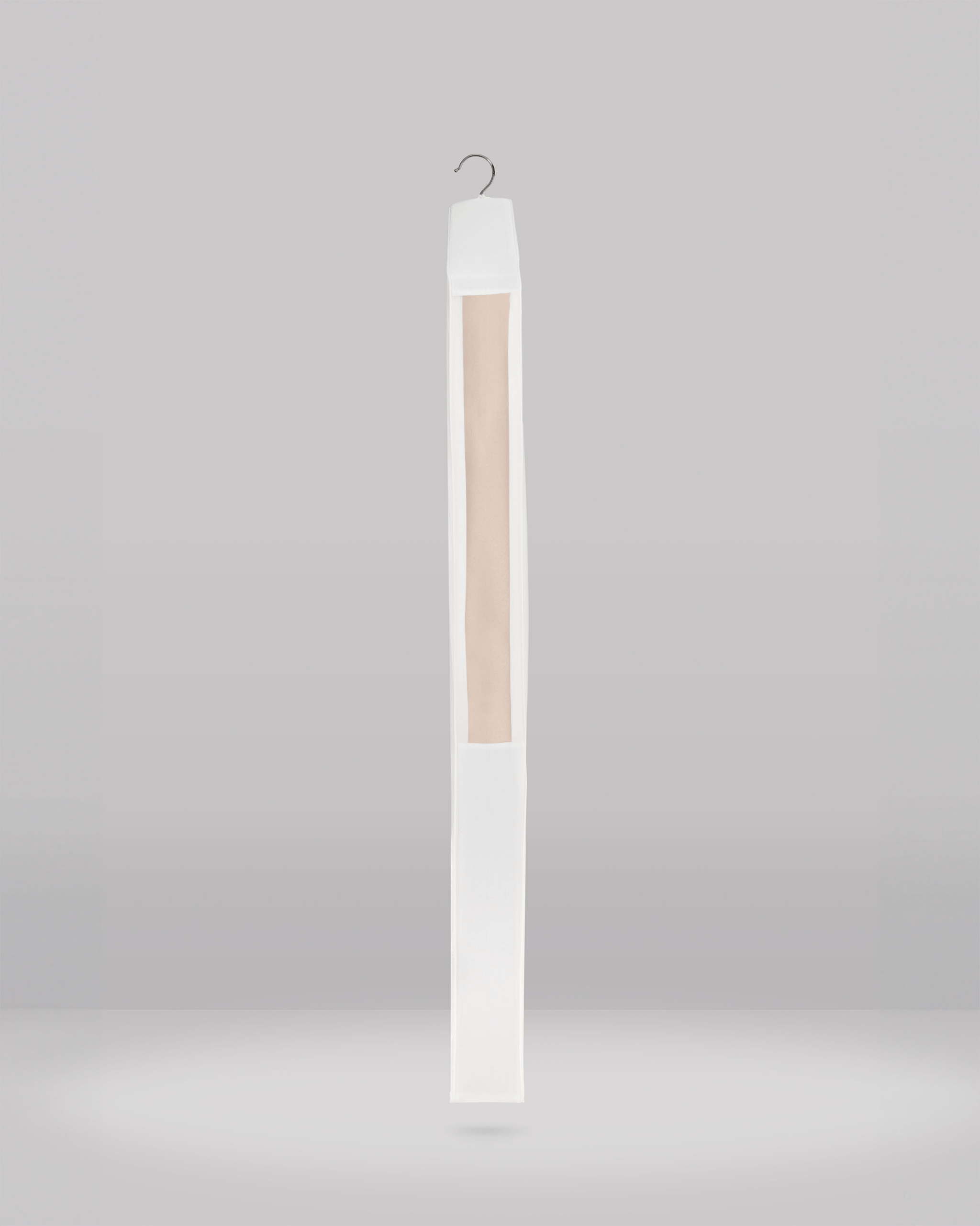 Tall, thin white object with a wooden panel on a gray background