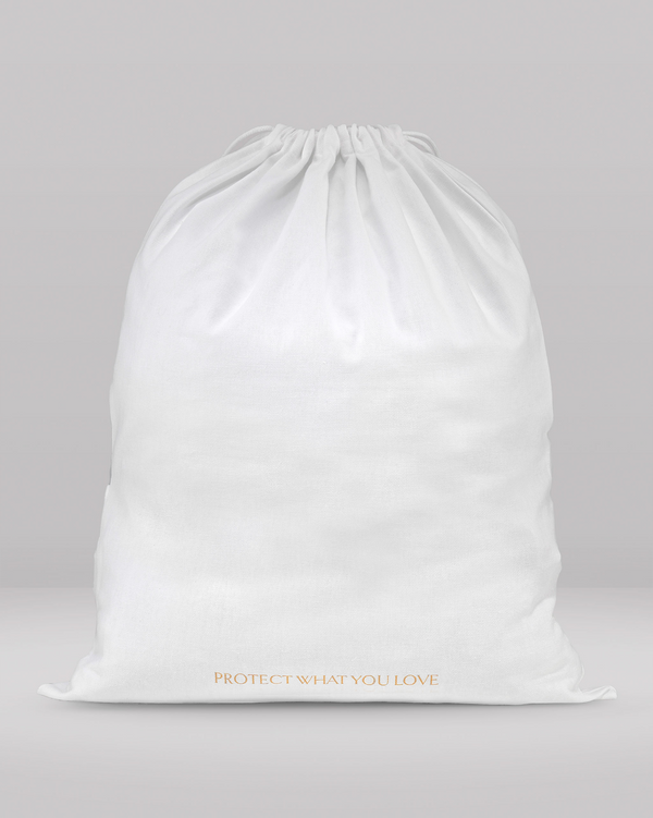 White drawstring bag with 'PROTECT WHAT YOU LOVE' text on a gray background