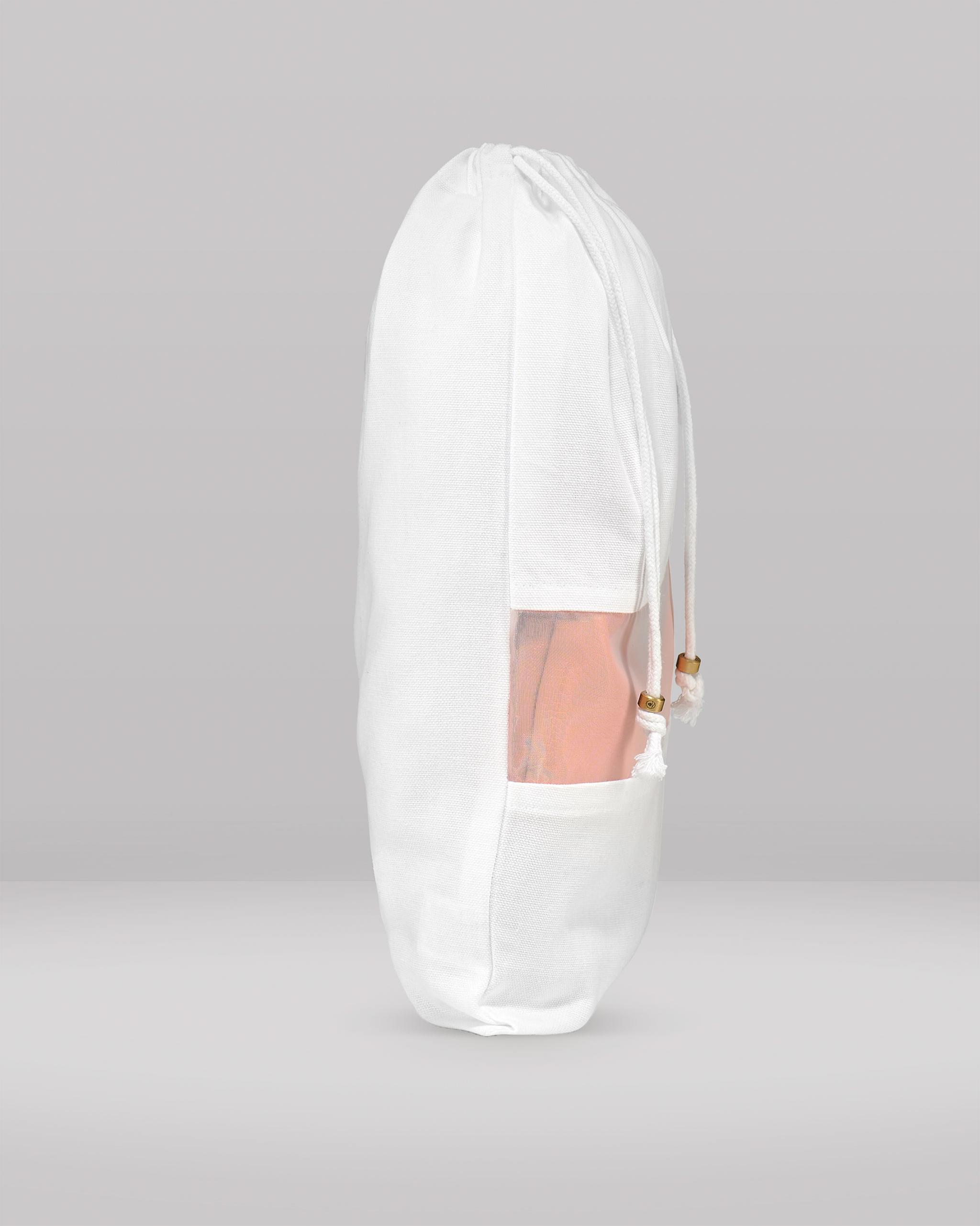 White clutch bag with sheer overlay on a gray background