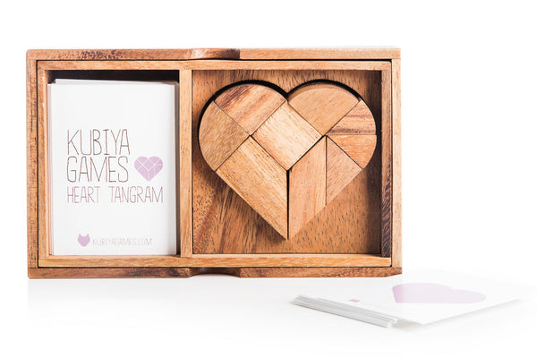 Wooden heart-shaped tangram puzzle in a box with 'Kubiya Games' branding.