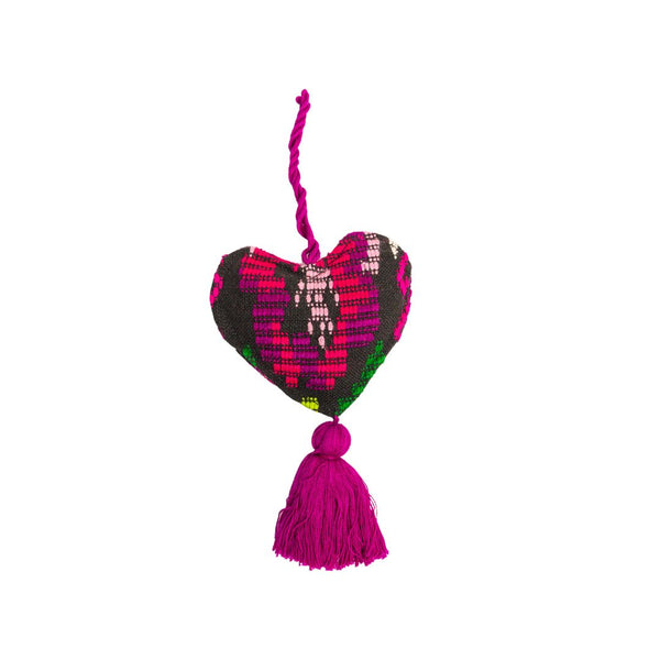 Add a touch of global charm to your home with our handcrafted Guatemalan Heart Ornament. Made from sustainable textiles and featuring a unique design, this ornament is perfect for Valentine's Day or year-round decor. Order yours today!